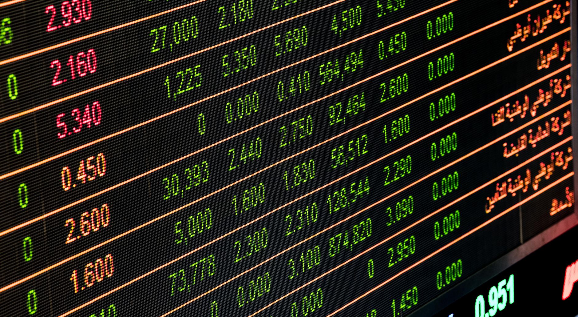 Detailed view of a stock market screen showing numbers and data, symbolizing financial trading. — Access Low-Cost, High-Speed