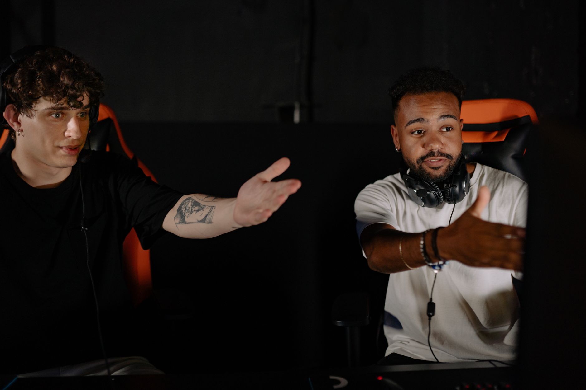 Two men intensely gaming, showcasing teamwork and strategy in a competitive online session. — How to Get Started with Live De
