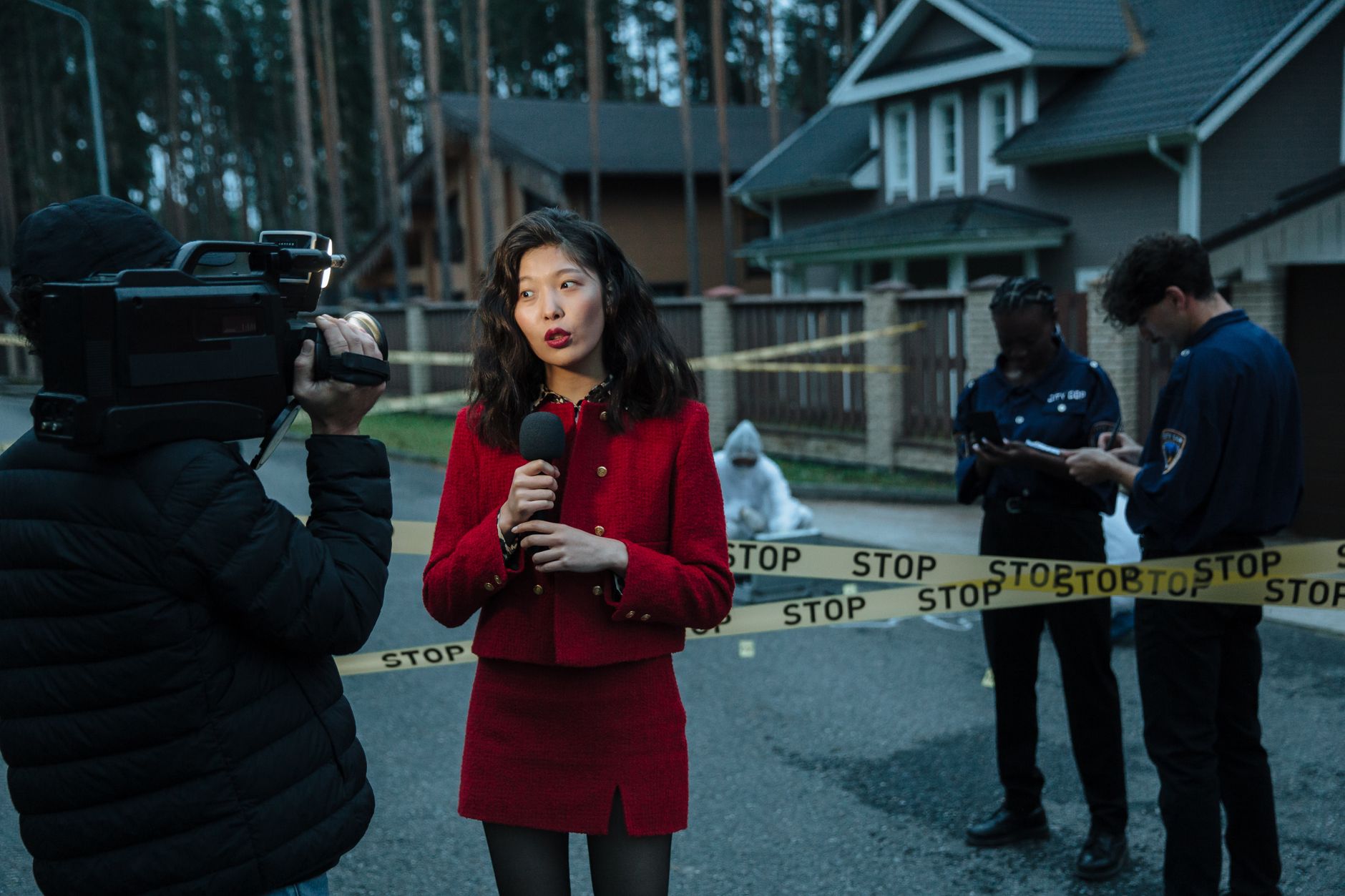 A journalist reporting from a crime scene with police officers and cameraman. — "Slot Machine Features You Need to Know About